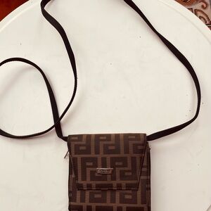 Brown Crossbody Bag with Geometric Pattern and Flap Closure